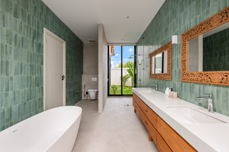 Main bathroom with freestanding tub and double vanity